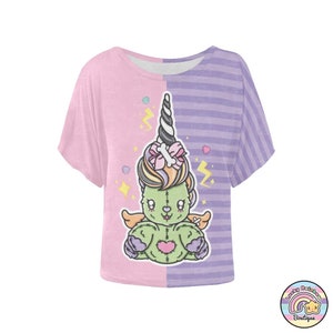 Green Unicorn T-shirt with Lightning Bolt Motifs and Stripe Pink and Purple Background.