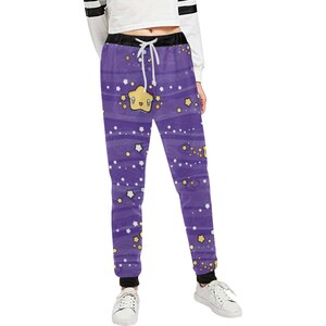 May include: Purple sweatpants with a white drawstring and a repeating pattern of yellow stars with smiling faces on a dark purple background.