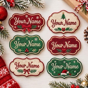 May include: Six decorative embroidered patches with scalloped edges, each featuring the text Your Name in cursive script. The designs include festive motifs like red bows, green holly, snowflakes, a Christmas tree, and a Santa hat.