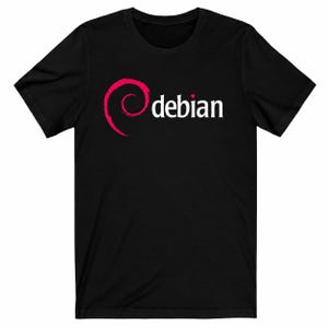 May include: A black short-sleeve t-shirt featuring the Debian logo on the chest. The graphic consists of a red swirl design positioned to the left of the white text "debian" written in a lowercase sans-serif font. The shirt has a crew neckline.