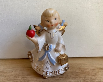 Vintage Lefton September Angel, Girl With Apple, Gold Books And Blonde Pig Tails, Blue Bow With Gold And Rhinestones