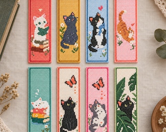 May include: Eight rectangular cross-stitch bookmarks featuring cat illustrations. The designs include cats with books, butterflies, and plants on backgrounds of red, yellow, blue, pink, teal, and white, each with a distinct colored border.