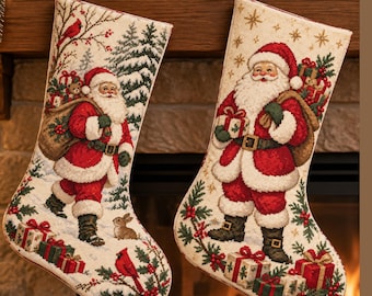 May include: Two cream-coloured Christmas stockings featuring woven tapestry designs. The left stocking shows Santa Claus with a sack, a rabbit, and a cardinal. The right stocking depicts Santa Claus holding a gift, surrounded by stars and wrapped presents.