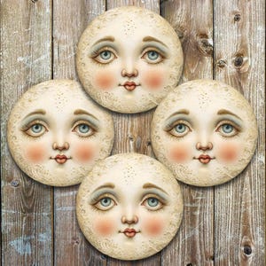 May include: Four circular decorative moon face pieces with blue eyes, rosy cheeks, and detailed eyelashes. The moon faces have a vintage, whimsical style, set against a rustic wooden background. Each moon face has a small, detailed mouth.