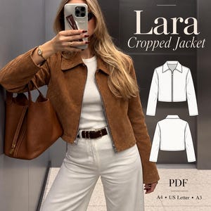 Può includere: Una giacca corta in camoscio marrone con colletto e chiusura frontale a zip. L'immagine include un disegno tecnico del davanti e del retro della giacca, con il testo Mira Patterns Lara Cropped Jacket, PDF, A4, US Letter e A3.