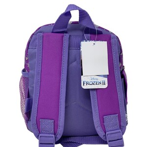May include: Purple Frozen II backpack with adjustable straps and a mesh side pocket. The backpack has a white tag with the text "Disney Frozen II".