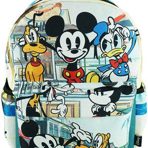 May include: A multi-colored backpack featuring Mickey Mouse, Donald Duck, and Pluto. The backpack has a blue, green, and white background with a cartoon cityscape. The text "Disney" is visible in the lower right corner.