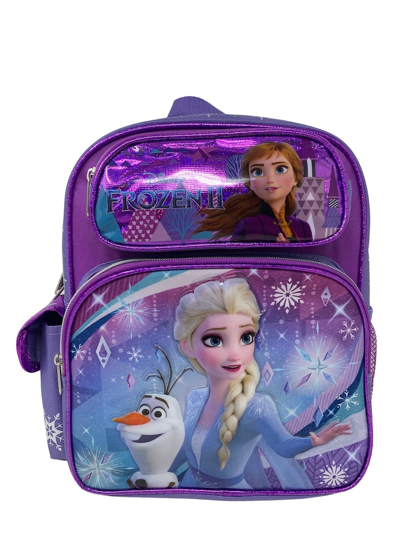 May include: Purple Frozen II backpack with a front pocket featuring Anna and Elsa from the movie. The main compartment has a large image of Elsa and Olaf.