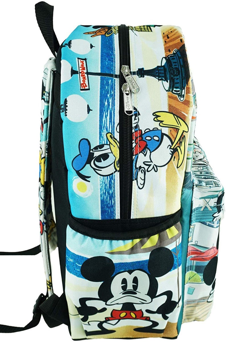 May include: A blue and white backpack with a beach scene featuring Mickey Mouse, Donald Duck, and Goofy. The backpack has a black zipper and a black handle. The text "Boardwalk" is printed on the backpack.
