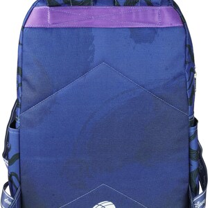 May include: A blue backpack with a purple strap and a white seashell design. The backpack has the word "Disney" printed on the straps.