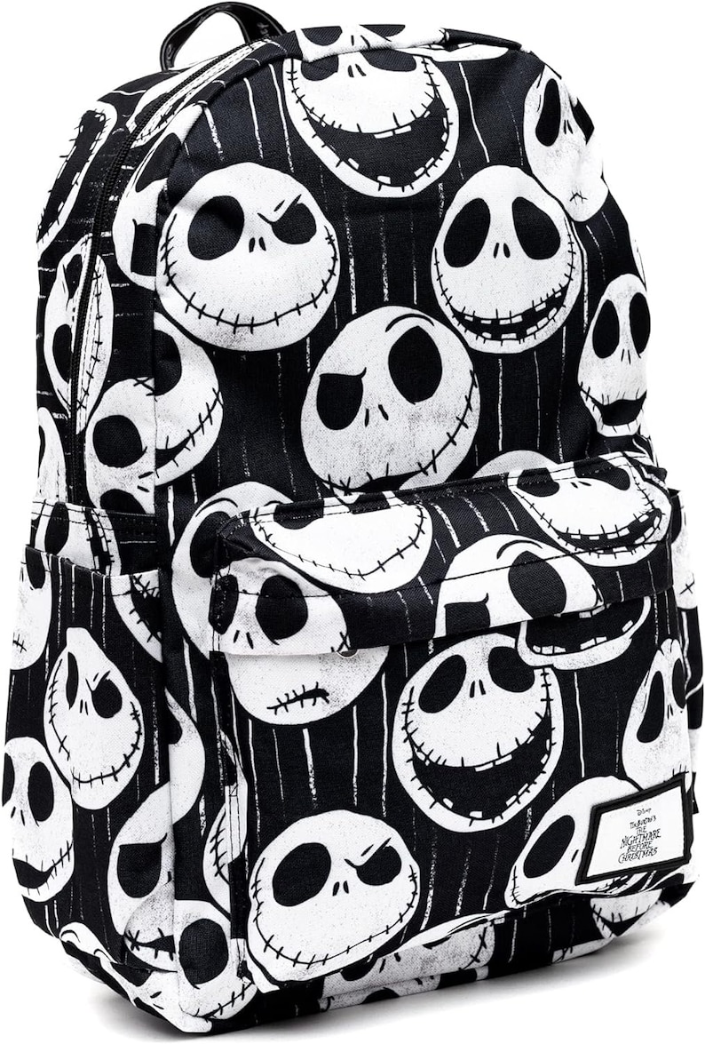 May include: Black backpack with a white and black pattern of Jack Skellington's face from The Nightmare Before Christmas. The backpack has a zippered pocket on the front and a small patch with the movie's logo.