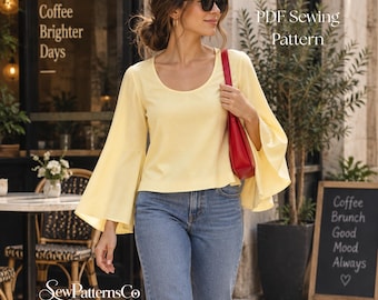 Peut inclure: Un haut jaune pâle à manches longues avec une encolure ronde et des manches évasées, porté avec un jean bleu et un sac à épaule rouge. L'image contient le texte PDF Sewing Pattern et SewPatternsCo.