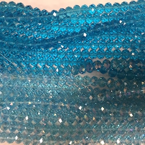 10mm crystal rondelle glass, 34 beads, faceted