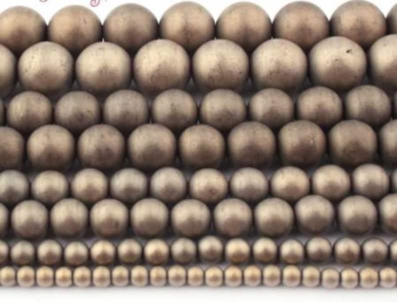 matte frosted non faceted beads Hematite round antique gold color