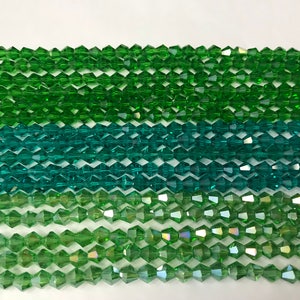 6mm crystal Bicone glass, around 45beads, faceted, 1strand