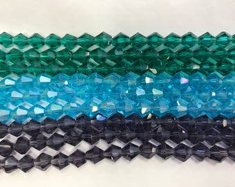 8mm crystal Bicone glass, around 33 beads, faceted, 1strand