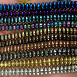 4mm hematite donut rondelle disc beads , around 130 beads