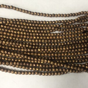 6mm hematite round faceted beads , around 78beads
