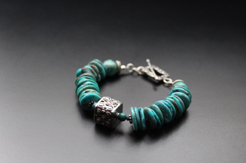 Sundance southwestern style Genuine turquoise and Bali bead chunky bracelet hand knotted sterling boho toggle blue shades jewelry