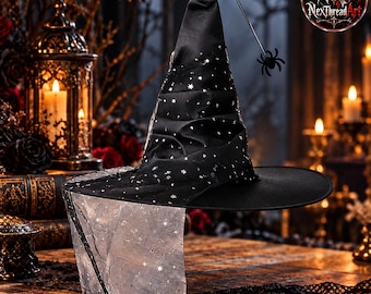 May include: A black pointed hat featuring a silver star pattern and a sheer, sparkling overlay. A small black spider charm hangs from a thin wire attached to the tip of the hat. The hat has a wide, flat brim and a structured, conical crown.