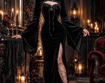 May include: A black velvet long-sleeve dress featuring a cutout neckline with a silver metal clasp, a lace-up bodice detail, and a high side slit. The dress is paired with a wide-brimmed hat, a choker, and fishnet stockings.