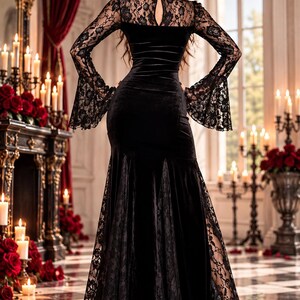 May include: A floor-length black velvet dress featuring long bell sleeves with intricate lace detailing, a high lace neckline with a keyhole cutout, and lace panels integrated into the skirt. The garment displays the NexThreadArt logo.