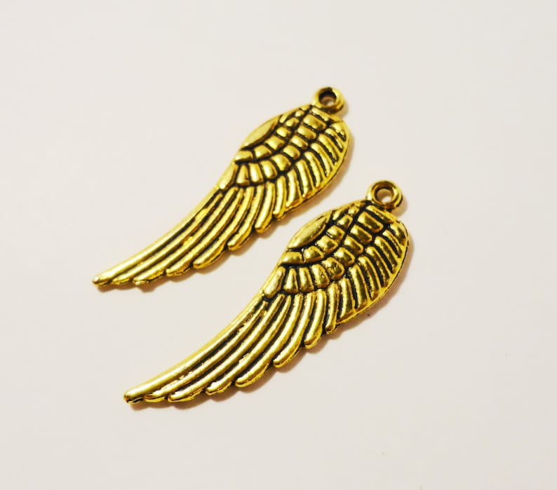 Tibetan Alloy Antique Silver Small Feathers Single Sided 19x4mm