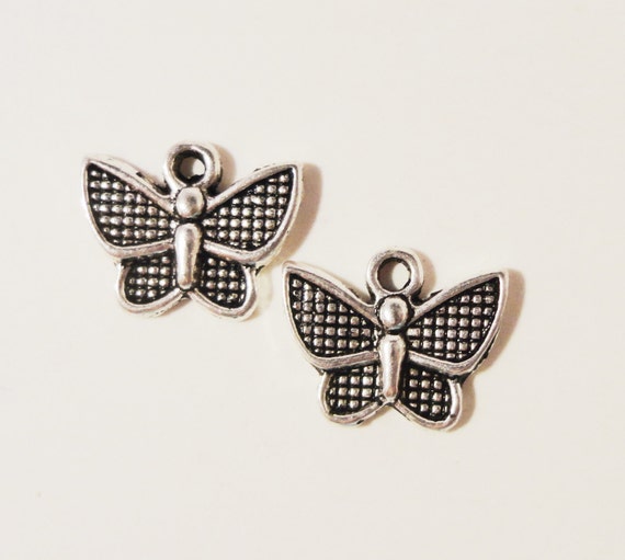 12 Butterfly charms antique silver tone A336