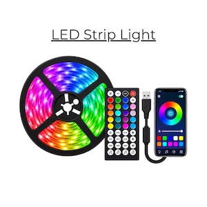 May include: An LED strip light on a black circular spool, a rectangular remote control with multi-colored buttons, and a smartphone displaying a color wheel app interface. The text LED Strip Light is visible at the top of the image.
