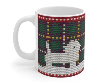May include: A white ceramic mug featuring a printed pattern that mimics a knitted texture. The design displays a white dog silhouette against a background of dark green, purple, and yellow plaid, framed by red and white horizontal borders.