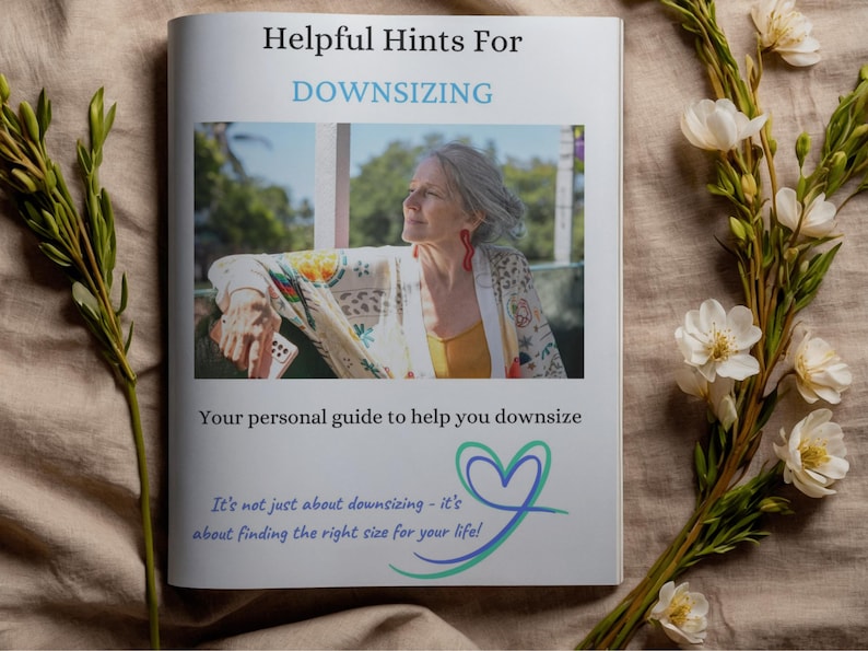 May include: A white booklet titled Helpful Hints For DOWNSIZING with a photograph of a person wearing a patterned cardigan and red earrings. The text reads Your personal guide to help you downsize and It's not just about downsizing - it's about finding the right size for your life! with a heart logo.