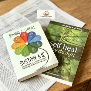 May include: Two books by Barbara O'Neill titled Sustain Me: A Handbook of Natural Remedies The 9 Foundational Pillars for Health and Self Heal by Design: The Role of Micro-organisms for Health, featuring a colourful wheel graphic and green imagery.