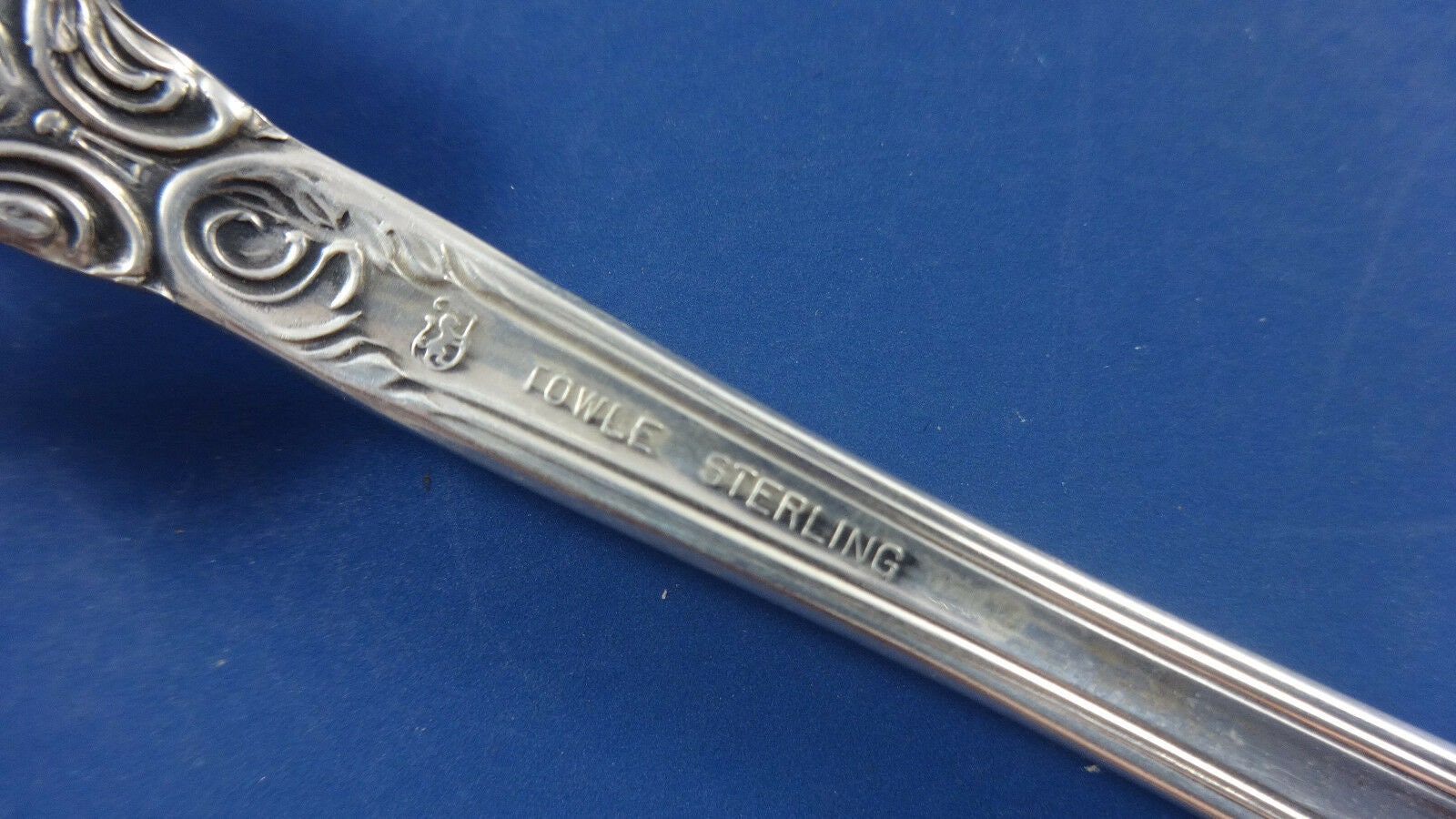 Old master deals silver place setting