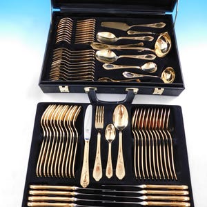 Sold at Auction: MENAGERE BESTECKE SOLINGEN - Façon vermeil - 12 couverts - (manque ustensil