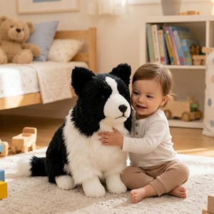May include: A large plush dog toy with black and white fur, featuring pointed ears, a white chest, and a white muzzle. The stuffed animal is designed to resemble a border collie and has a soft, textured exterior with dark eyes and a black nose.