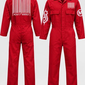 May include: A bright red jumpsuit featuring a large white barcode graphic with the number 742617 00002 7 on the back. The front includes a smaller matching barcode, a white circular logo on the left sleeve, and a white tribal-style graphic on the right sleeve.