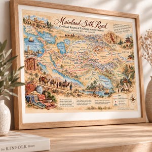 May include: A framed map titled Mainland Silk Road, depicting overland routes of exchange across Eurasia from the 2nd century BCE to the 15th century CE. The map features illustrations of camels, trade goods, and landmarks, with red, blue, and green lines.