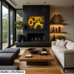 May include: A rectangular wall art print featuring a cluster of vibrant yellow sunflowers against a dark background, displayed above a fireplace. The print measures 30 by 40 inches, providing a bold contrast to the black stone fireplace surround.