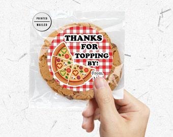 May include: Round sticker with a red and white checkered background. The sticker features a pizza slice with toppings and the text "Thanks for Topping By!" with the words "From, [Name]" at the bottom.