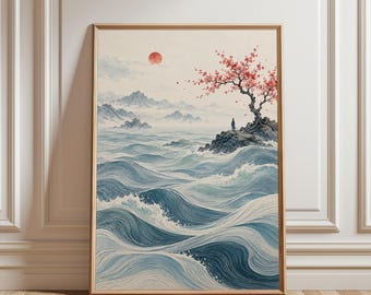 May include: A framed vertical wall art print depicting a turbulent ocean with blue and white waves. A rocky outcrop features a single tree with pink blossoms and a small figure standing near the shore. A red sun hangs in a pale sky above mountains.