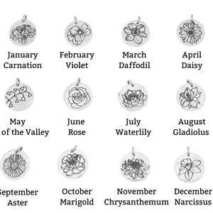 May include: Twelve silver-coloured pendant charms, each engraved with a different flower and the month's name. The flowers include a carnation, violet, daffodil, daisy, lily of the valley, rose, waterlily, gladiolus, aster, marigold, chrysanthemum, and narcissus.