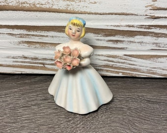 Vintage Blonde Girl in White Dress Holding Pink Flowers Ceramic Figurine