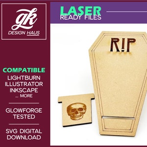 Puede incluir: Un soporte de teléfono de madera con forma de ataúd con el texto "RIP" en la parte delantera. El soporte tiene un diseño de calavera en el lateral.