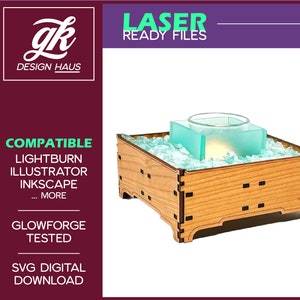 May include: A wooden laser-cut box with a square teal-colored glass container inside, filled with light blue decorative stones. The box has a natural wood finish and is designed for laser cutting. Text on the image says "LASER READY FILES".