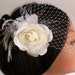 see more listings in the Veil and Flower Clip section