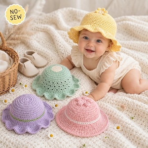 May include: Three handmade crochet sun hats in yellow, mint green, and lavender, each featuring a scalloped brim and a small flower accent on the crown. A yellow hat is worn by a baby, while the mint and lavender hats are displayed nearby.