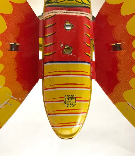 Vintage // Metal Lithographed Butterfly Push Toy on Wheels
