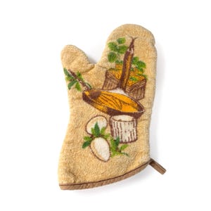 May include: A white ceramic mug with a black handle and the text "But First, Coffee" in a handwritten style. The mug is on a white surface. The mug is approximately 4 inches tall.