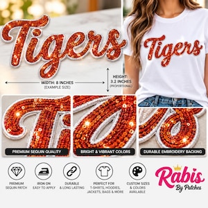 May include: A script-style iron-on patch featuring the word Tigers in bright orange sequins with a white border. The patch measures 20.32 cm in width and 8.13 cm in height. It is shown applied to a white t-shirt, highlighting the sequin texture, embroidery backing, and vibrant orange colour scheme.