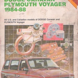 May include: A Chilton Book Company repair manual for 1984-88 Dodge Caravan and Plymouth Voyager models. The cover features a maroon minivan, mechanical engine parts, and a toolbox illustration against a grid background with white text.